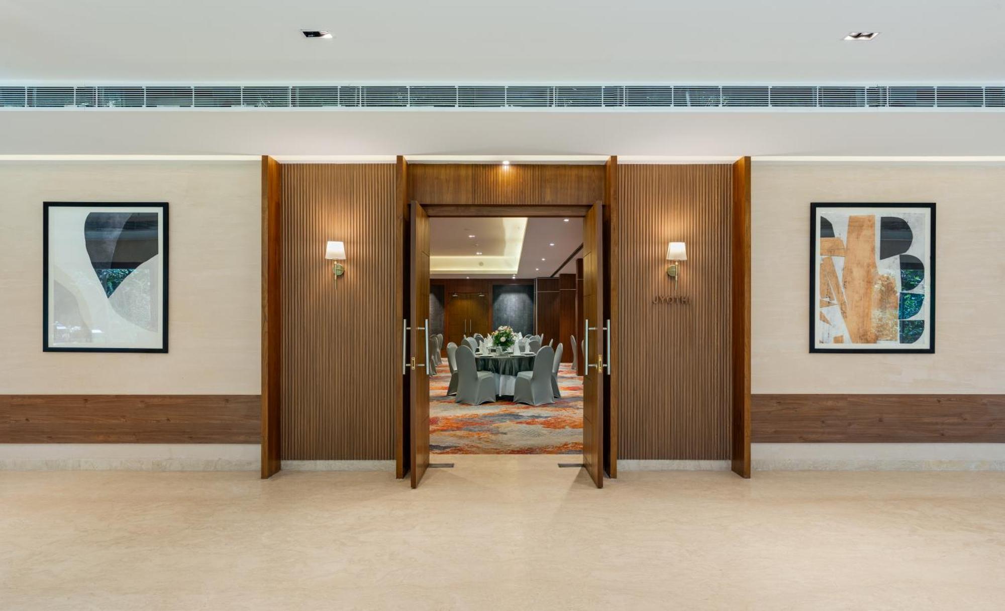 Southern Star,Mysore Exterior photo The entrance to the ballroom at the hotel